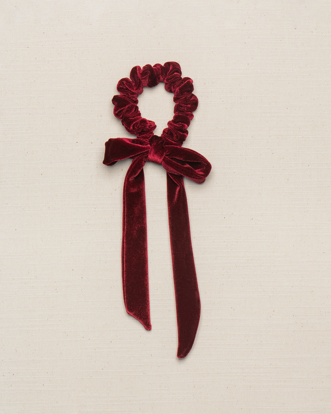 THE BURGUNDY VELVET SCRUNCHIE WITH BOW